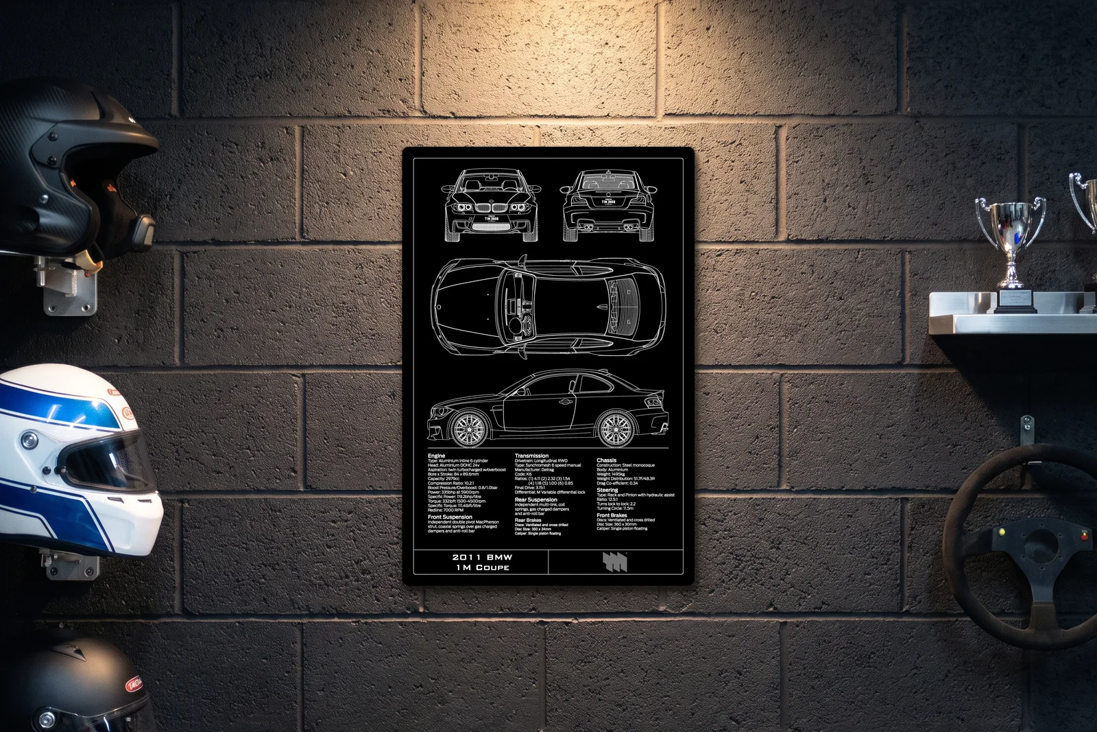 2011 BMW 1M Coupe, on a racing wall, portrait